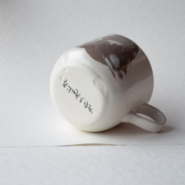 Skaite Mug 08 that got too friendly with the kiln shelves